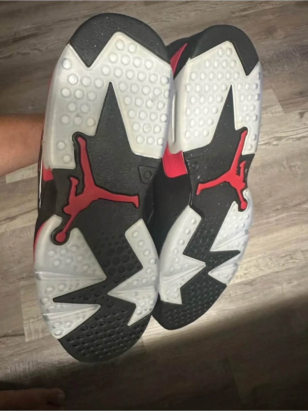 Jordan Black High-Top Sneakers with Red Heel Pull